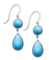 Pool blue perfection. Round and pear-cut turquoise stones (5 mm and 8 mm) adorn these pretty sterling silver drop earrings. Approximate drop: 1 inch x 1/2 inch.