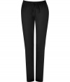 Perfect for dressing either up or down, Paul & Joes sporty black wool drawstring pants count as a multi-season must - Elasticized drawstring waistline, satin tuxedo stripes, side and back slit pockets - Slim, straight leg - Wear with luxe knit tops and edgy accessories