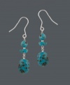 The perfect summer hue. Accent your wardrobe with fresh drops by Avalonia Road. Earrings feature turquoise nugget beads in a sterling silver setting. Approximate drop: 1-3/4 inches.