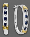 Classic elegance. Round-cut blue sapphires (1/4 ct. t.w.) and white sapphires (1/4 ct. t.w.) add sparkling emphasis to a stylish pair of hoop earrings. Crafted in sterling silver and 14k gold. Approximate diameter: 3/4 inch.