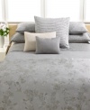 Serene sophistication. This Regent Damask coverlet from Calvin Klein provides a luxurious layer on your bed.