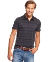 Trim down your polo look with this striped slim-fit shirt from Hugo Boss.