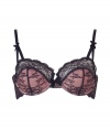 Get the sultry glamorous look of a vintage 1950s pin up girl in Von Follies by Dita Von Teeses black and peach-pink stretch lace and fishnet balconette bra - Underwire style with wired sides, structured cups with lightly padded half-cups, scalloped sheer black stretch lace trim on cups, triangle-detailed adjustable satin straps with silver-toned hardware, fishnet sides with sheer ruffled trim, iconic soft elastic triangle cross back detail, adjustable silver-toned back hook-and-eye closures - Wear with the matching briefs for a seriously seductive look