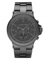 Shadowy in gunmetal tones, this chronograph watch from Michael Kors adds edge to your wardrobe.