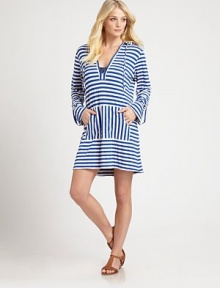 A casual coverup with a classic print and a relaxed fit. Attached hoodV-neckLong sleevesButton-tab roll cuffsKangaroo pockets92% rayon/8% spandexDry cleanMade in USA A casual coverup with a classic print and a relaxed fit. Attached hoodV-neckLong sleevesButton-tab roll cuffsKangaroo pockets92% rayon/8% spandexDry cleanMade in USA
