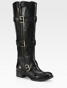 Undeniably cool leather design with adjustable buckle straps, exposed zippers and a stacked heel. Stacked heel, 1½ (40mm)Shaft, 16½Leg circumference, 15Leather upperExposed zipper on both sidesAdjustable buckle strapsLeather liningRubber solePadded insoleImported Undeniably cool leather design with adjustable buckle straps, exposed zippers and a stacked heel. Stacked heel, 1½ (40mm)Shaft, 16½Leg circumference, 15Leather upperExposed zipper on both sidesAdjustable buckle strapsLeather liningRubber solePadded insoleImported