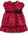 Dots galore adorn this beautiful dress by Sweet Heart Rose.