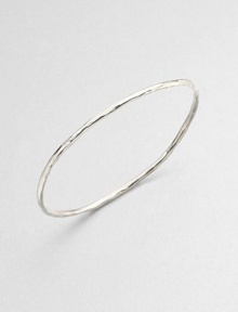 A simply chic style in hammered sterling silver, perfect for stacking. Sterling silverDiameter, about 2.5Slip-on styleImported A simply chic style in hammered sterling silver, perfect for stacking. Sterling silverDiameter, about 2.5Slip-on styleImported
