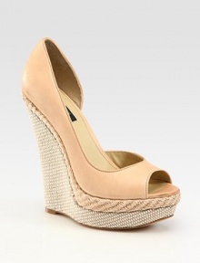 Tastefully textured wedge characterized by an espadrille insert and elegant leather d'Orsay silhouette. Raffia wedge, 6 (150mm)Raffia platform, 1½ (40mm)Compares to a 4½ heel (115mm)Leather upperLeather lining and solePadded insoleImportedOUR FIT MODEL RECOMMENDS ordering one half size up as this style runs small. Tastefully textured wedge characterized by an espadrille insert and elegant leather d'Orsay silhouette. Raffia wedge, 6 (150mm)Raffia platform, 1½ (40mm)Compares to a 4½ heel (115mm)Leather upperLeather lining and solePadded insoleImportedOUR FIT MODEL RECOMMENDS ordering one half size up as this style runs small.