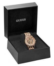 A captivating skeleton dial mixed with crystal shine make this GUESS watch an alluring creation.