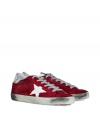 Luxe with a retro edge, these sneakers from Golden Goose will kick your style into high gear - Round toe, lace up style, side star detail, contrasting rubber sole, supple red suede with white leather trim - Pair with jeans or cargo pants, a tee, and a leather jacket