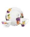 A mix of edgy, artsy blooms in modern porcelain make kate spade new york's Charcoal Floral place setting a chic new showcase for casual fare. Minimalist coupe shapes temper bright, fun colors with sleek elegance.