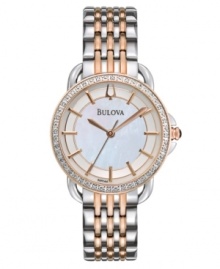Classic Bulova elegance with contemporary eye-catching appeal. Watch crafted of two-tone stainless steel bracelet and round case. Bezel embellished with 24 diamond accents. Mother-of-pearl dial features applied rose-gold tone stick indices, three hands and logo. Quartz movement. Water resistant to 30 meters. Three-year limited warranty. Classic Bulova elegance with contemporary eye-catching appeal. Watch crafted of two-tone stainless steel bracelet and round case. Bezel embellished with 24 diamond accents. Mother-of-pearl dial features applied rose-gold tone stick indices, three hands and logo. Quartz movement. Water resistant to 30 meters. Three-year limited warranty.
