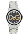 A unique cutout dial adds a modern edge to this classic watch by D&G. Stainless steel bracelet and round case with black turning bezel. Black grid-patterned dial features numerals at twelve and six o'clock, stick indices, minute track, three hands and gold tone logo cutout. Quartz movement. Water resistant to 50 meters. Two-year limited warranty.