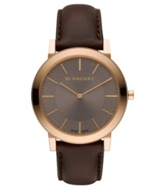 This Burberry timepiece features a brown leather strap and round rose-gold ion-plated stainless steel case with sapphire crystal. Textured taupe dial with smooth sunray inner dial features rose-gold tone stick indices, two hands and logo. Swiss quartz movement. Water resistant to 30 meters. Two-year limited warranty. This Burberry timepiece features a brown leather strap and round rose-gold ion-plated stainless steel case with sapphire crystal. Textured taupe dial with smooth sunray inner dial features rose-gold tone stick indices, two hands and logo. Swiss quartz movement. Water resistant to 30 meters. Two-year limited warranty.