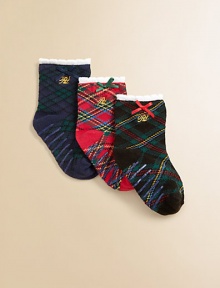 Festive plaid socks keep tiny feet comfy and cozy.Non-skid bottoms58% cotton/22% polyester/18% nylon/1% rubber/1% spandexMachine washImported