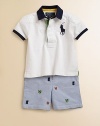 A preppy short sleeved rugby and oxford shorts with allover athletic embroidery are paired to make the perfect preppy set. Shirt Contrast twill collarShort sleeves with contrast trim at the hemFront buttonDiamond-quilted front and back yokeDouble back vents Shorts Front button closureZip flyBelted waistband with elastic back and matching double D-ring beltSide on-seam pocketsButton-through back welt pocketCottonMachine washImported