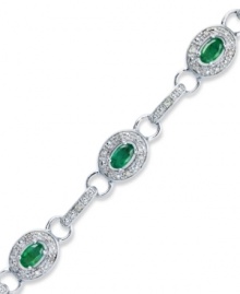 Enviable sparkle that everyone will want to get their hands on. This glam tennis bracelet highlights oval-cut emeralds (2 ct. t.w.) and round-cut diamonds (1/4 ct. t.w.) in sterling silver. Approximate length: 7-1/4 inches.