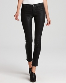 A coated finish lends a leather-like effect to these J Brand skinny jeans, creating a tough-chic look. A coated finish lends a leather-like effect to these J Brand skinny jeans, creating a tough-chic look.