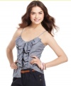 A grand display of ruffles creates a chic cascade on this chambray top from Tommy Girl! Looks awesome with relaxed bottoms and a few cool bangles!