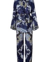 Effortless and incredibly luxurious, Emilio Puccis silk pajamas are perfect for wearing ready-to-wear as a sartorial take on one of this seasons favorite trends - Top with notched collar, long sleeves, piped trim throughout, front patch pockets, self-tie sash around the waist, side slits - Trousers with drawstring waistline, wide leg - Easy fit - Wear out with statement accessories and chunky gold jewelry