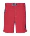 Sporty swim trunks in fine, red cotton and nylon blend - Casually cool, cut to hit mid-thigh - Drawstring tie waist and flap pocket at rear - Extra-large, iconic navy polo pony graphic - Stylish and utilitarian, perfect for the beach or vacation - Wear solo or pair with a t-shirt or polo and leather flip flops