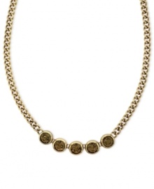 Subtle chic. Jessica Simpson's frontal necklace, crafted from gold-tone mixed metal, features a row of glass light topaz stones for a stylishly understated approach. Approximate length: 16 inches. Subtle chic. Jessica Simpson's frontal necklace, crafted from gold-tone mixed metal, features a row of glass light topaz stones for a stylishly understated approach. Approximate length: 16 inches.