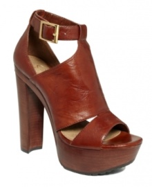 Tough girl with an eye on trends. The Kylie sandals by Jessica Simpson are crave-worthy in rich leather with a chunky wooden platform heel. Tough girl with an eye on trends. The Kylie sandals by Jessica Simpson are crave-worthy in rich leather with a chunky wooden platform heel.