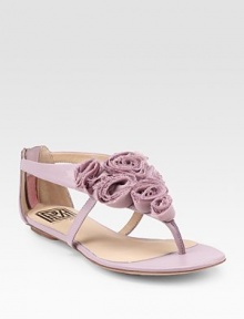 THE LOOKThong sandal with chiffon rosettes Back zipperTHE FITStacked heel, ¼ (5mm)THE MATERIALLeather upper Leather lining and sole Padded insoleORIGINImported THE LOOKThong sandal with chiffon rosettes Back zipperTHE FITStacked heel, ¼ (5mm)THE MATERIALLeather upper Leather lining and sole Padded insoleORIGINImported