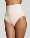 A contour thong shapewear that visibly slims and smoothes the tummy for a sleek silhouette.