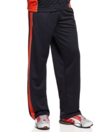 Add a shot of color to your workout wear with these color-blocked mesh track pants from Puma. Add a shot of color to your workout wear with these color-blocked mesh track pants from Puma.