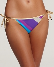 Channel a vintage vibe pool side with MARC BY MARC JACOBS' striped string bikini. With metallic trim, this 70's-inspired bottom looks leisurely with flat sandals and oversized shades.