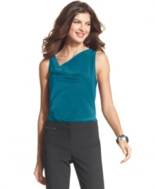 Ellen Tracy's cowl-neck top is an easy basic you can wear all seasons. Available in two versatile colors, it adds a polished touch to any ensemble. Ellen Tracy's cowl-neck top is an easy basic you can wear all seasons. Available in two versatile colors, it adds a polished touch to any ensemble.