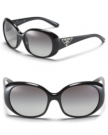 Glam it up in Prada's round sunglasses with signature triangle logo at temples. Glam it up in Prada's round sunglasses with signature triangle logo at temples.
