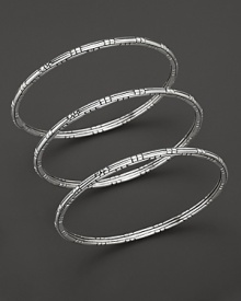 From the Bedeg Collection, three slender sterling silver bangles, perfect for stacking. From the Bedeg Collection, three slender sterling silver bangles, perfect for stacking.