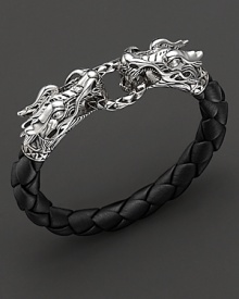 From the Naga collection, a black woven leather bracelet with a double dragon detail, designed by John Hardy. From the Naga collection, a black woven leather bracelet with a double dragon detail, designed by John Hardy.