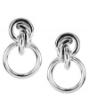 Valley Girl chic. AK Anne Klein revives a vintage doorknocker design with a modern twist with knot detail. Crafted in imitation rhodium-plated mixed metal. Approximate drop: 1 inch.