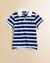 A timelessly preppy short-sleeved polo shirt in lightweight, striped cotton.Shirt collarShort sleevesButton-frontRibbed collar and armbandsUneven vented hemCottonMachine washImported Please note: Number of buttons may vary depending on size ordered. 