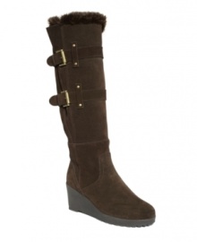 Even the most durable winter boots can look sleek and stylish, as demonstrated by Khombu's Rainbow! Crafted in waterproof suede, they feature a faux fur cuff, buckle hardware detailing and trendy wedge heel. Plush lining and a comfort insole with Thermolite for insulation will keep you warm and dry throughout the season. Even the most durable winter boots can look sleek and stylish, as demonstrated by Khombu's Rainbow! Crafted in waterproof suede, they feature a faux fur cuff, buckle hardware detailing and trendy wedge heel. Plush lining and a comfort insole with Thermolite for insulation will keep you warm and dry throughout the season.