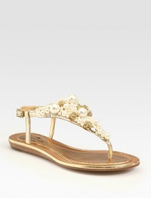Glitzy rhinestones and precious pearl-like embellishments make this metallic leather flat an absolute must. Metallic leather upperRhinestone and pearl-like embellishmentsLeather lining and solePadded insoleImported Glitzy rhinestones and precious pearl-like embellishments make this metallic leather flat an absolute must. Metallic leather upperRhinestone and pearl-like embellishmentsLeather lining and solePadded insoleImported