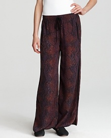 Luxe silk takes on sleek python print in these wide-leg Rebecca Taylor pants. Perfect teamed with a snug fall knit. Luxe silk takes on sleek python print in these wide-leg Rebecca Taylor pants. Perfect teamed with a snug fall knit.