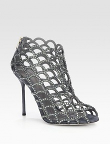 Light-catching Swarovski crystals adorn this modern cage silhouette rendered in soft Italian suede. Self-covered heel, 4¼ (110mm)Swarovski crystal-coated suede upperPeep toeBack zipLeather lining and solePadded insoleMade in Italy Light-catching Swarovski crystals adorn this modern cage silhouette rendered in soft Italian suede. Self-covered heel, 4¼ (110mm)Swarovski crystal-coated suede upperPeep toeBack zipLeather lining and solePadded insoleMade in Italy
