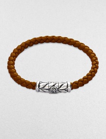 From the Weave Collection. Woven rubber is accented with an intricately engraved silver clasp.Sterling silver Rubber Width, about 5.5mm Length, about 7 Chevron clasp closure Imported From the Weave Collection. Woven rubber is accented with an intricately engraved silver clasp.Sterling silver Rubber Width, about 5.5mm Length, about 7 Chevron clasp closure Imported