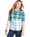 For weekend style and laid-back days, you can't go wrong with a plaid top! This button-down from Destinee features a cool, fading print that we adore.