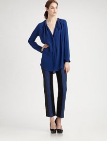 Soft pleating all around the neckline defines the graceful shape of this slightly sheer silk design with ties at the neck.Round neckline with front V and pleatingSoft self tiesPullover stylingLong sleeves with bracelet cuffsModified shirttail hemAbout 27 from shoulder to hemSilkDry cleanImportedSIZE & FITModel shown is 5'9 (175cm) wearing US size 4. Soft pleating all around the neckline defines the graceful shape of this slightly sheer silk design with ties at the neck.Round neckline with front V and pleatingSoft self tiesPullover stylingLong sleeves with bracelet cuffsModified shirttail hemAbout 27 from shoulder to hemSilkDry cleanImportedSIZE & FITModel shown is 5'9 (175cm) wearing US size 4.