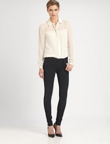 Semi-sheer silk design with modern paneling and a hidden button front. Point collarHidden button frontLong sleeves with buttoned cuffsAbout 26 from shoulder to hemSilkDry cleanImported Model shown is 5'11 (180cm) wearing US size 4.