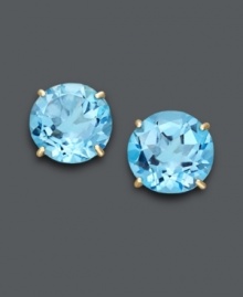 Splash into a pool of blue. Earrings feature round-cut blue topaz (7-1/5 ct. t.w.) set in 14k gold. Approximate diameter: 1/2 inch.