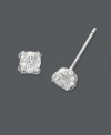 Exceptionally glamorous. These intriguing diamond stud earrings (3/4 ct. t.w.) feature round-cut, prong-set diamonds with pave-set diamond accents at the sides. Crafted in 14k white gold. Approximate diameter: 4 mm.