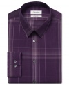 Put a modern spin on office attire with this slim-fit multi-stripe shirt from Calvin Klein.