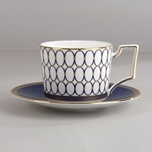 Embellished with intricate garlands, oval links and a fanciful dragon motif, this Wedgwood dinnerware evokes Europe's glorious Renaissance period. Rendered in deep blue and gold to transform any formal meal into a spectacular royal gala. Embellished with intricate garlands, oval links and a fanciful dragon motif, this Wedgwood dinnerware evokes Europe's glorious Renaissance period. Rendered in deep blue and gold to transform any formal meal into a spectacular royal gala.
